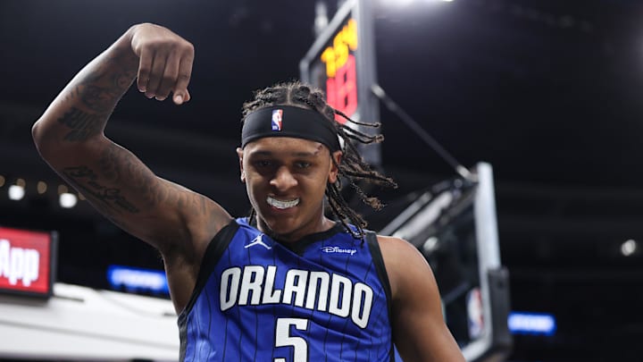 Apr 15, 2025; Orlando, Florida, USA: Orlando Magic forward Paolo Banchero (5) reacts after basket against the Atlanta Hawks in the fourth quarter at Kia Center. Mandatory Credit: Nathan Ray Seebeck-Imagn Images