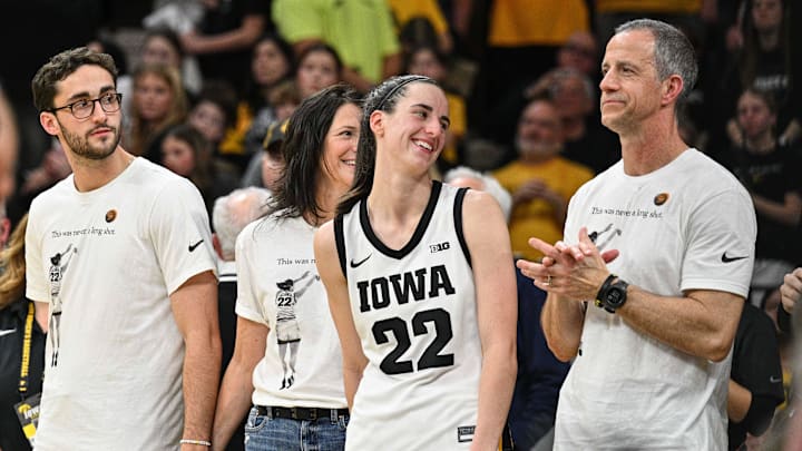 Mar 3, 2024; Iowa City, Iowa, USA; Iowa Hawkeyes guard Caitlin Clark (22) and her family look on after the game against the Ohio State Buckeyes at Carver-Hawkeye Arena. Mandatory Credit: Jeffrey Becker-Imagn Images