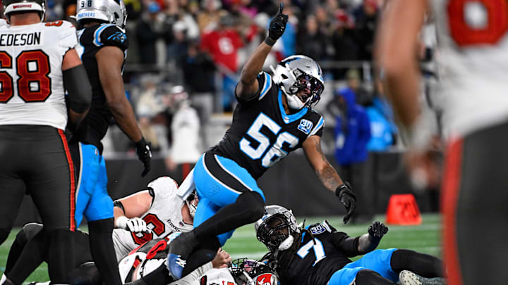 Dec 1, 2024; Charlotte, North Carolina, USA; Carolina Panthers linebacker Trevin Wallace (56) reacts in overtime at Bank of America Stadium. Mandatory Credit: Bob Donnan-Imagn Images Dec 1, 2024; Charlotte, North Carolina, USA; Carolina Panthers linebacker Trevin Wallace (56) reacts in overtime at Bank of America Stadium. Mandatory Credit: Bob Donnan-Imagn Images