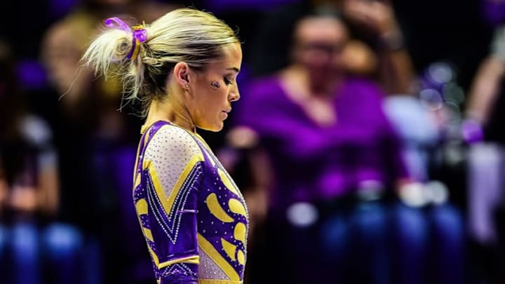 LSU Gymnast Livvy Dunne prepares for her beam routine.