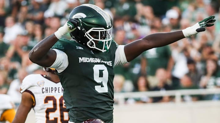 Michigan State defensive lineman Zion Young (9) celebrates a tackle against Central Michigan defensive lineman Jacques Bristol (10) during the first half at Spartan Stadium in East Lansing on Friday, Sept. 1, 2023.