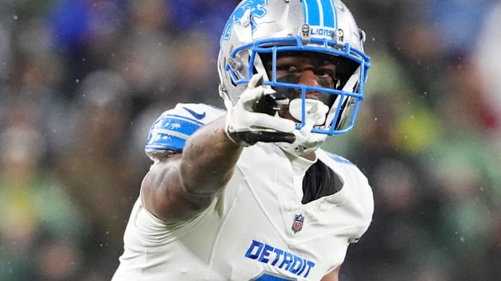 Nov 3, 2024; Green Bay, Wisconsin, USA;  Detroit Lions wide receiver Allen Robinson II (8) celebrates after earning a first down during the second quarter against the Green Bay Packers at Lambeau Field. Mandatory Credit: Jeff Hanisch-Imagn Images