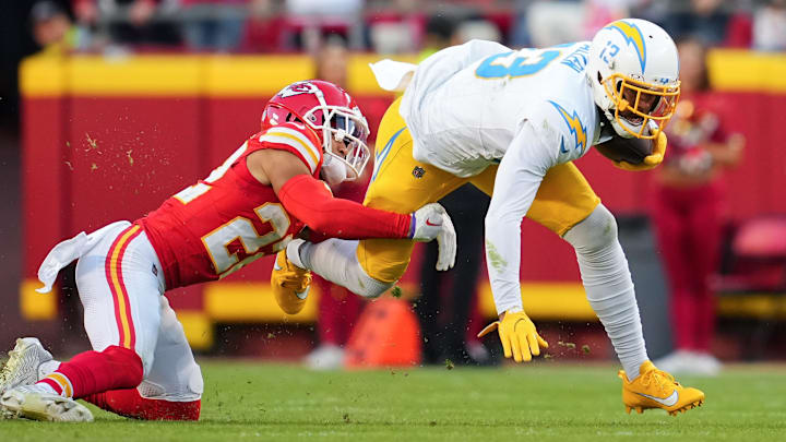 Oct 22, 2023; Kansas City, Missouri, USA; Los Angeles Chargers wide receiver Keenan Allen (13) is tackled by Kansas City Chiefs cornerback Trent McDuffie (22) during the second half at GEHA Field at Arrowhead Stadium. Mandatory Credit: Jay Biggerstaff-Imagn Images Oct 22, 2023; Kansas City, Missouri, USA; Los Angeles Chargers wide receiver Keenan Allen (13) is tackled by Kansas City Chiefs cornerback Trent McDuffie (22) during the second half at GEHA Field at Arrowhead Stadium. Mandatory Credit: Jay Biggerstaff-Imagn Images