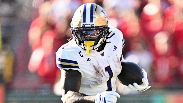 Oct 4, 2025; College Park, Maryland, USA;  Washington Huskies running back Jonah Coleman (1) carries the ball against the Maryland Terrapins at SECU Stadium. Mandatory Credit: Jamie Sabau-Imagn Images