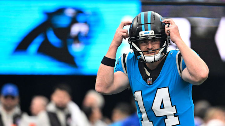Oct 26, 2025; Charlotte, North Carolina, USA;  Carolina Panthers quarterback Andy Dalton (14) calls a play in the fourth quarter against the Buffalo Bills at Bank of America Stadium. Mandatory Credit: Bob Donnan-Imagn Images