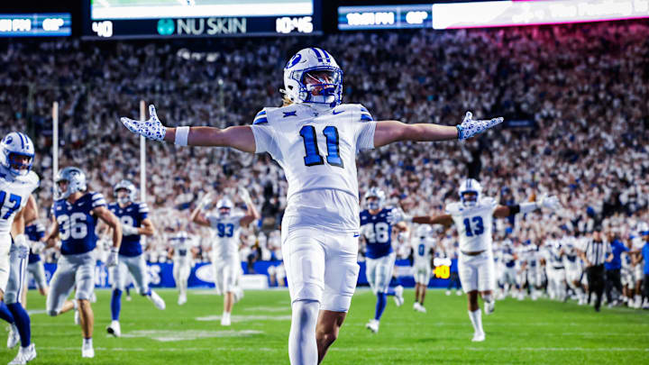 BYU punt returner Parker Kingston returns a punt for a touchdown against Kansas State