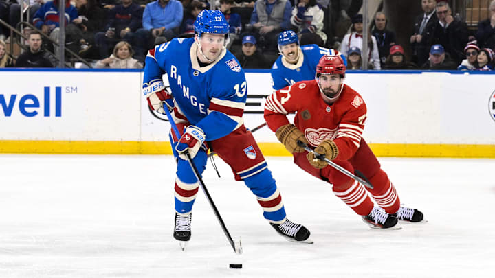 Nov 16, 2025; New York, New York, USA; New York Rangers left wing Alexis Lafrenière (13) skates past Detroit Red Wings center Dylan Larkin (71) during the third period at Madison Square Garden. Mandatory Credit: John Jones-Imagn Images Nov 16, 2025; New York, New York, USA; New York Rangers left wing Alexis Lafrenière (13) skates past Detroit Red Wings center Dylan Larkin (71) during the third period at Madison Square Garden. Mandatory Credit: John Jones-Imagn Images