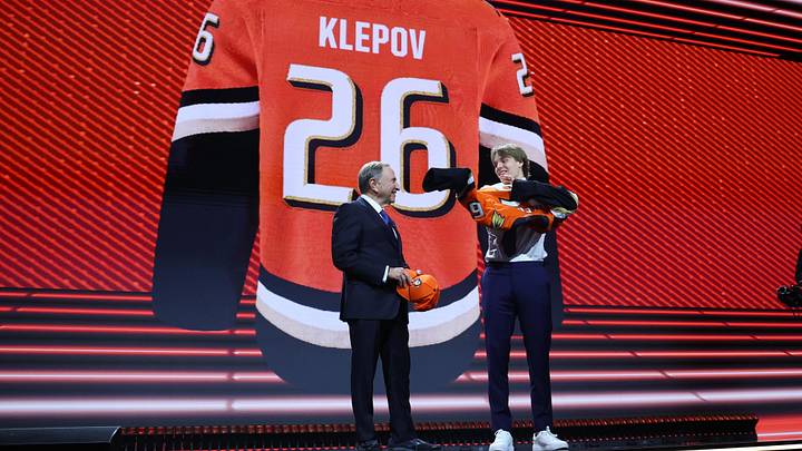 Jun 26, 2026; Buffalo, New York, USA; Nikita Klepov reacts beside NHL commissioner Gary Bettman after being selected with the fifteenth pick in the first round of the 2026 NHL Draft by the Anaheim Ducks at KeyBank Center. Mandatory Credit: Timothy T. Ludwig-Imagn Images