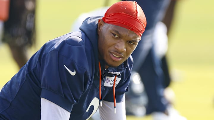 Jul 23, 2025; Lake Forest, IL, USA; Former Chicago Bears wide receiver DJ Moore (2) warms up during training camp at Halas Hall.