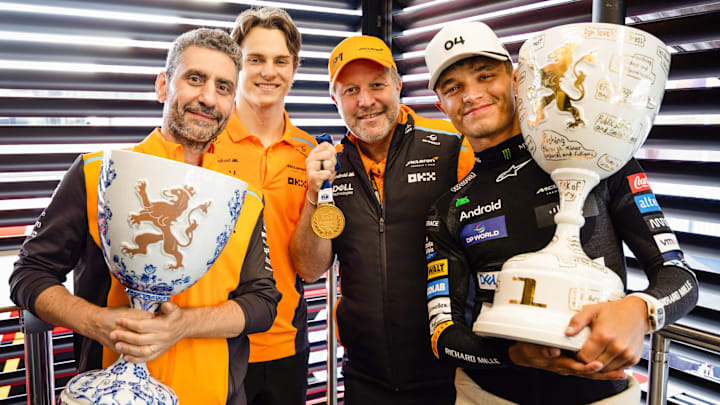 Andrea Stella, Oscar Piastri, Zak Brown, and Lando Norris
