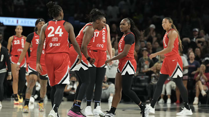 Jul 22, 2025; Las Vegas, Nevada, USA; Las Vegas Aces guard Chelsea Gray (12) reacts to guard Dana Evans (11) during a timeout in the second quarter of their game against the Atlanta Dream at Michelob Ultra Arena. Jul 22, 2025; Las Vegas, Nevada, USA; Las Vegas Aces guard Chelsea Gray (12) reacts to guard Dana Evans (11) during a timeout in the second quarter of their game against the Atlanta Dream at Michelob Ultra Arena.