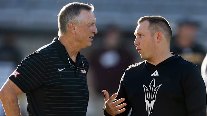 Oct 25, 2025; Tempe, Arizona, USA; Houston Cougars  head coach Willie Fritz (left) with Arizona State Sun Devils head coach Kenny Dillingham at Mountain America Stadium. Mandatory Credit: Mark J. Rebilas-Imagn Images