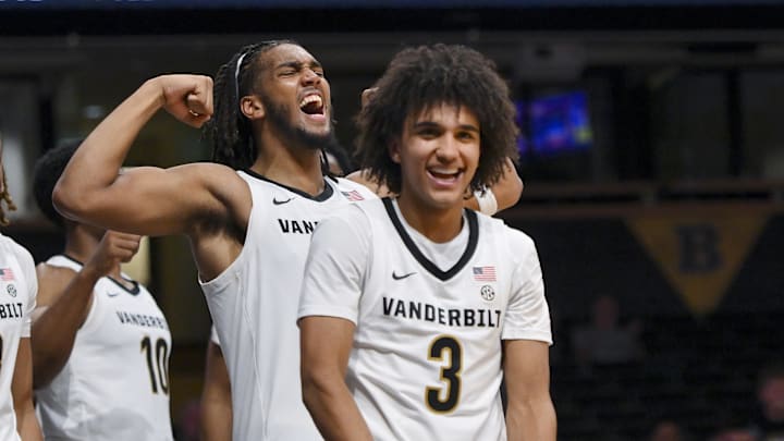 Nov 3, 2025; Nashville, Tennessee, USA;  Vanderbilt Commodores guard Tyler Tanner (3) and forward Devin McGlockton (99) celebrate a made basket plus the foul against the Lipscomb Bisons during the second half at Memorial Gymnasium. Mandatory Credit: Steve Roberts-Imagn Images
