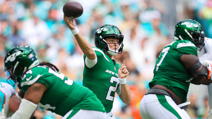 New York Jets quarterback Zach Wilson (2) throws the football against the Miami Dolphins during the first quarter at Hard Rock Stadium.