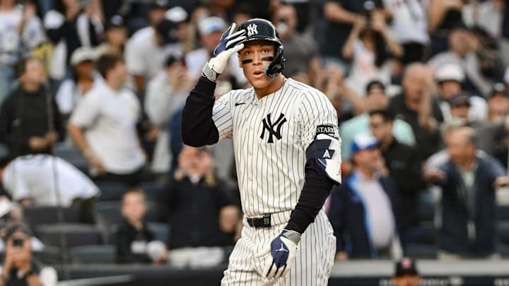 Jun 8, 2025; Bronx, New York, USA; New York Yankees outfielder Aaron Judge (99) reacts after hitting a two-run home run against the Boston red Sox during the first inning at Yankee Stadium. Mandatory Credit: John Jones-Imagn Images