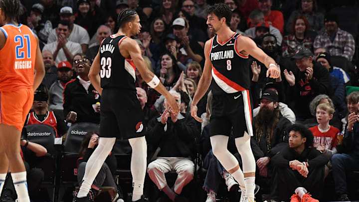 Nov 1, 2024; Portland, Oregon, USA; Portland Trail Blazers forward Deni Avdija (8) reacts with forward Toumani Camara (33) after making a shot during the second quarter at Moda Center. Mandatory Credit: Brian Murphy-Imagn Images