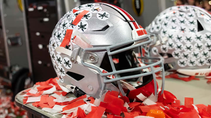 Jan 20, 2025; Atlanta, GA, USA; Detailed view of confetti with an Ohio State Buckeyes helmet after winning the CFP National Championship college football game at Mercedes-Benz Stadium.