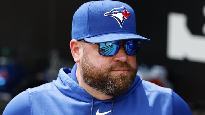  Toronto Blue Jays manager John Schneider looks on from the dugout before a baseball game against the Chicago White Sox at Rate Field.