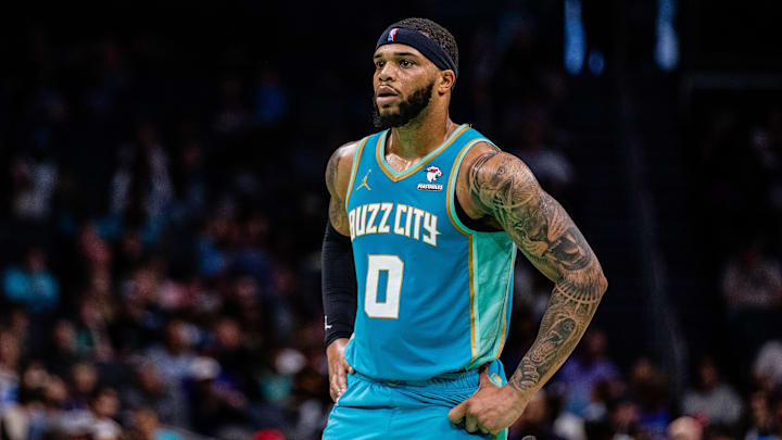 Apr 7, 2024; Charlotte, North Carolina, USA; Charlotte Hornets forward Miles Bridges (0) looks on during the third quarter against the Oklahoma City Thunder at Spectrum Center.