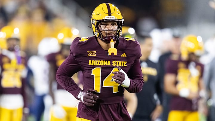Nov 28, 2025; Tempe, Arizona, USA; Arizona State Sun Devils tight end AJ Ia (14) against the Arizona Wildcats during the 99th Territorial Cup at Mountain America Stadium. Mandatory Credit: Mark J. Rebilas-Imagn Images