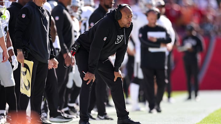 Dec 8, 2024; Tampa, Florida, USA; Las Vegas Raiders head coach Antonio Pierce looks on against the Tampa Bay Buccaneers in the second quarter at Raymond James Stadium. Mandatory Credit: Nathan Ray Seebeck-Imagn Images