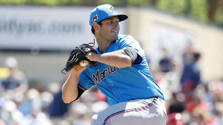 Mar 18, 2025; Jupiter, Florida, USA;  Miami Marlins pitcher Connor Gillispie (55) pitches against the St. Louis Cardinals during the first inning at Roger Dean Chevrolet Stadium.