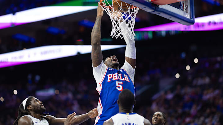 Oct 30, 2024; Philadelphia, Pennsylvania, USA; Philadelphia 76ers center Andre Drummond (5) dunks the ball against the Detroit Pistons during the third quarter at Wells Fargo Center. Mandatory Credit: Bill Streicher-Imagn Images