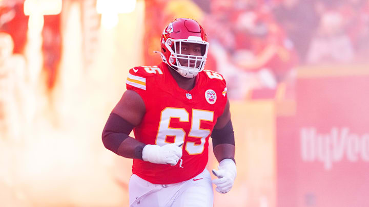 Jan 26, 2025; Kansas City, MO, USA; Kansas City Chiefs guard Trey Smith (65) against the Buffalo Bills in the AFC Championship game at GEHA Field at Arrowhead Stadium. Mandatory Credit: Mark J. Rebilas-Imagn Images