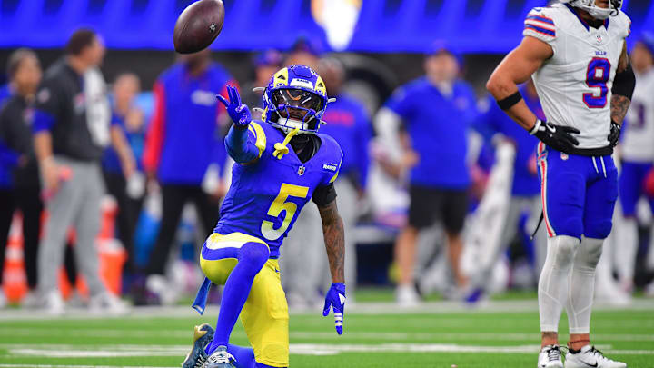 Dec 8, 2024; Inglewood, California, USA; Los Angeles Rams wide receiver Tutu Atwell (5) reacts after catching a pass for first down against the Buffalo Bills during the second half at SoFi Stadium. Mandatory Credit: Gary A. Vasquez-Imagn Images
