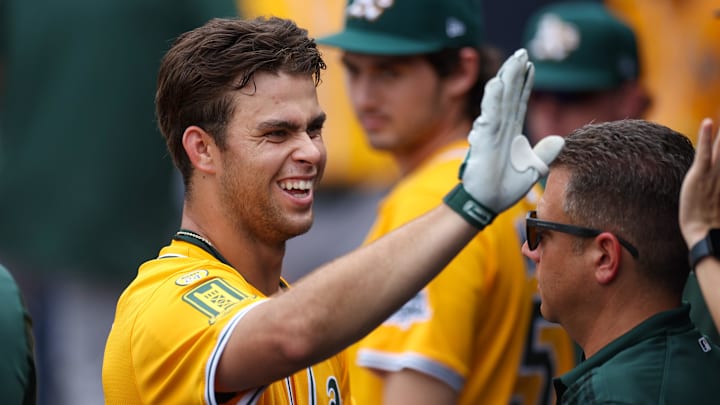 Jul 2, 2025; Tampa, Florida, USA; Athletics third baseman Max Muncy (10) reacts after hitting a home run against the Tampa Bay Rays in the ninth inning at George M. Steinbrenner Field. Mandatory Credit: Nathan Ray Seebeck-Imagn Images