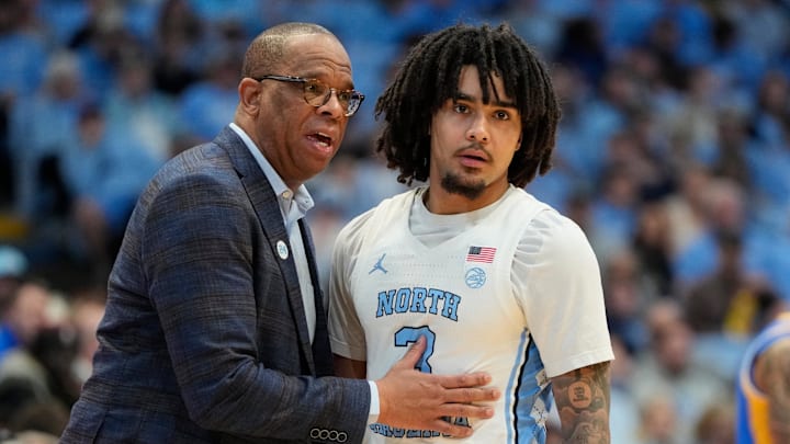 UNC basketball head coach Hubert Davis and guard Elliot Cadeau