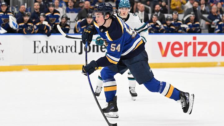 Mar 26, 2026; St. Louis, Missouri, USA; St. Louis Blues right wing Dalibor Dvorsky (54) takes a shot against the San Jose Sharks in overtime at Enterprise Center. Mandatory Credit: Joe Puetz-Imagn Images