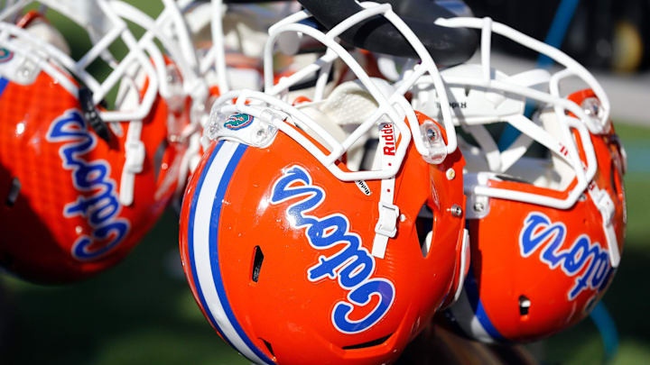 Jan 2, 2017; Tampa , FL, USA; Florida Gators helmets hang on the bench in the during the second half against the Iowa Hawkeyes at Raymond James Stadium. Florida Gators defeated the Iowa Hawkeyes 30-3. Mandatory Credit: Kim Klement-Imagn Images Jan 2, 2017; Tampa , FL, USA; Florida Gators helmets hang on the bench in the during the second half against the Iowa Hawkeyes at Raymond James Stadium. Florida Gators defeated the Iowa Hawkeyes 30-3. Mandatory Credit: Kim Klement-Imagn Images
