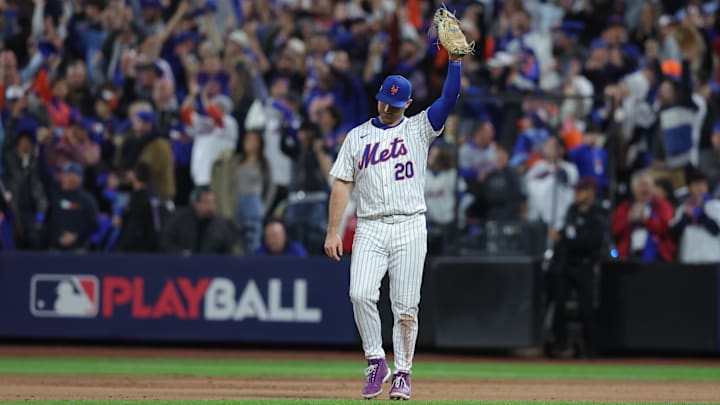 Oct 18, 2024; New York City, New York, USA; New York Mets first base Pete Alonso (20) celebrates defeating the Los Angeles Dodgers during game five of the NLCS for the 2024 MLB playoffs at Citi Field. Mandatory Credit: Brad Penner-Imagn Images