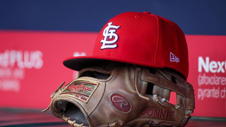 Apr 21, 2025; Atlanta, Georgia, USA; A St. Louis Cardinals hat and glove in the dugout against the Atlanta Braves in the first inning at Truist Park. Mandatory Credit: Brett Davis-Imagn Images Apr 21, 2025; Atlanta, Georgia, USA; A St. Louis Cardinals hat and glove in the dugout against the Atlanta Braves in the first inning at Truist Park. Mandatory Credit: Brett Davis-Imagn Images