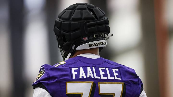 May 7, 2022; Owings Mills, MD, USA; Baltimore Ravens tackle Daniel Faalele (77) looks on during rookie minicamp at Under Armour Performance Center. Mandatory Credit: Scott Taetsch-USA TODAY Sports
