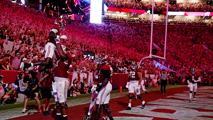 Sep 28, 2024; Tuscaloosa, Alabama, USA; Alabama Crimson Tide wide receiver Germie Bernard (5) celebrates after scoring a touchdown during the first quarter against the Georgia Bulldogs at Bryant-Denny Stadium. Sep 28, 2024; Tuscaloosa, Alabama, USA; Alabama Crimson Tide wide receiver Germie Bernard (5) celebrates after scoring a touchdown during the first quarter against the Georgia Bulldogs at Bryant-Denny Stadium.