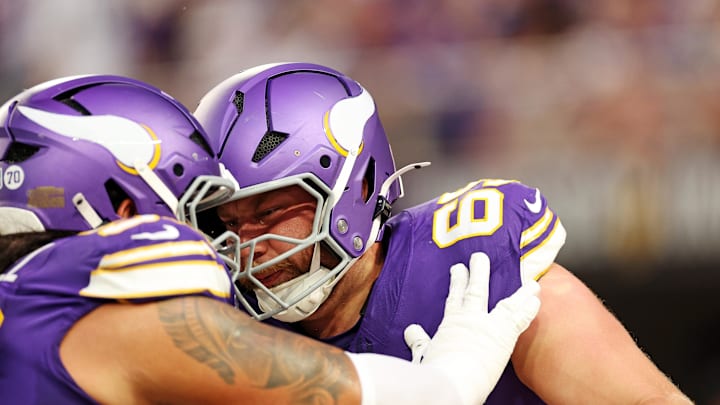 Sep 14, 2025; Minneapolis, Minnesota, USA; Minnesota Vikings guard Michael Jurgens (65) and v50 huddle up before the game against the Atlanta Falcons at U.S. Bank Stadium. Mandatory Credit: Matt Krohn-Imagn Images