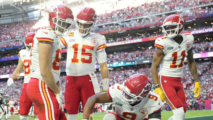 Kansas City Chiefs tight end Travis Kelce (87) celebrates with teammates after catching a touchdown