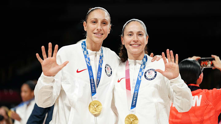 Aug 8, 2021; Saitama, Japan; United States players Diana Taurasi and Sue Bird celebrate with their gold medals after the women's basketball gold medal match during the Tokyo 2020 Olympic Summer Games at Saitama Super Arena. Mandatory Credit: James Lang-Imagn Images Aug 8, 2021; Saitama, Japan; United States players Diana Taurasi and Sue Bird celebrate with their gold medals after the women's basketball gold medal match during the Tokyo 2020 Olympic Summer Games at Saitama Super Arena. Mandatory Credit: James Lang-Imagn Images