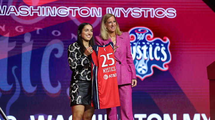 Apr 14, 2025; New York, New York, USA; Georgia Amoore poses with WNBA commissioner Cathy Engelbert after being selected with the number six overall pick to the Washington Mystics in the 2025 WNBA Draft at The Shed at Hudson Yards. Mandatory Credit: Vincent Carchietta-Imagn Images Apr 14, 2025; New York, New York, USA; Georgia Amoore poses with WNBA commissioner Cathy Engelbert after being selected with the number six overall pick to the Washington Mystics in the 2025 WNBA Draft at The Shed at Hudson Yards. Mandatory Credit: Vincent Carchietta-Imagn Images