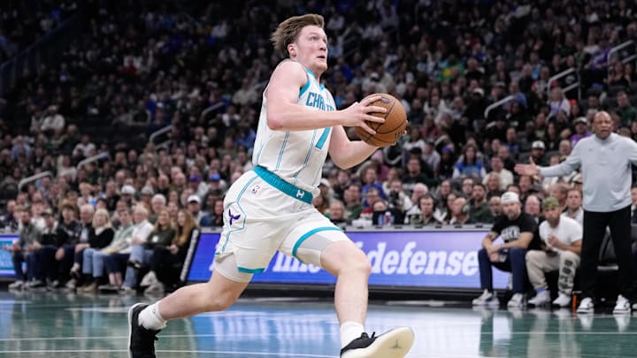 Nov 14, 2025; Milwaukee, Wisconsin, USA;  Charlotte Hornets guard Kon Knueppel (7) drives for the basket during the second quarter against the Milwaukee Bucks at Fiserv Forum. Mandatory Credit: Jeff Hanisch-Imagn Images