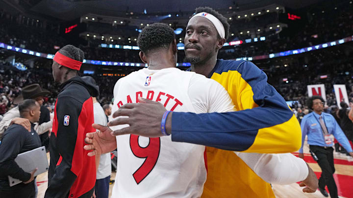 Nov 18, 2024; Toronto, Ontario, CAN; Indiana Pacers forward Pascal Siakam (43) hugs Toronto Raptors guard RJ Barrett (9) at the end of the fourth quarter at Scotiabank Arena. Mandatory Credit: Nick Turchiaro-Imagn Images