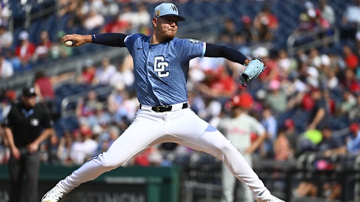 Aug 16, 2025; Washington, District of Columbia, USA; Washington Nationals starting pitcher Cade Cavalli (24) throws to the Philadelphia Phillies during the second inning at Nationals Park. 