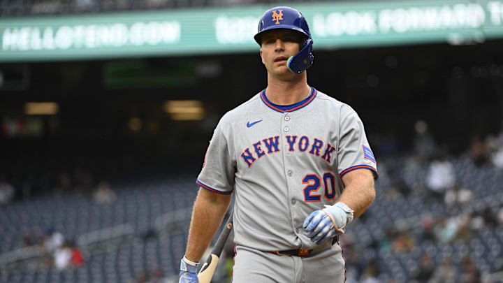 Aug 21, 2025; Washington, District of Columbia, USA; New York Mets first baseman Pete Alonso (20) reacts after striking out against the Washington Nationals during the first inning at Nationals Park. Mandatory Credit: Brad Mills-Imagn Images