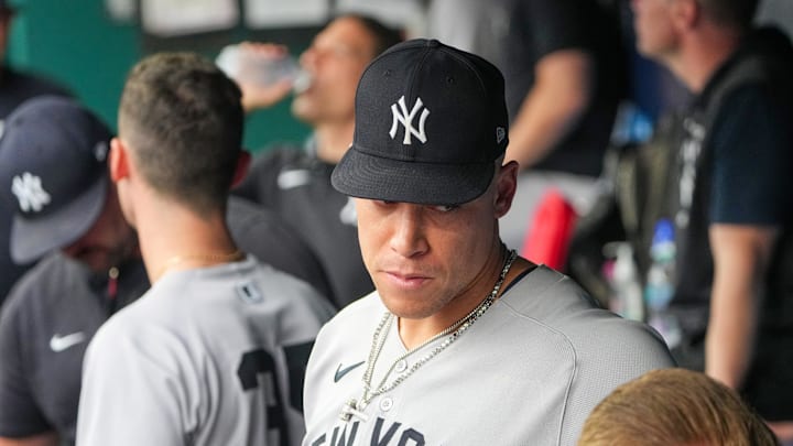 Jun 12, 2025; Kansas City, Missouri, USA; New York Yankees right fielder Aaron Judge (99) looks on in the dugout against the Kansas City Royals during the third inning at Kauffman Stadium. Mandatory Credit: Denny Medley-Imagn Images