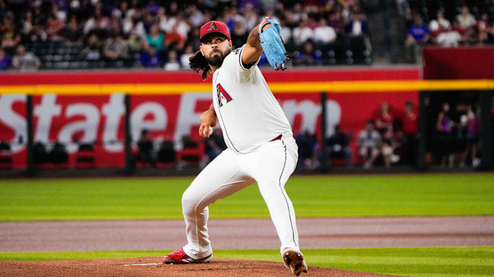 Sep 2, 2025; Phoenix, Arizona, USA; Arizona Diamondbacks pitcher Nabil Crismatt (61) pitches in the first inning of the game between Arizona Diamondbacks and Texas Rangers at Chase Field. Mandatory Credit: Arianna Grainey-Imagn Images