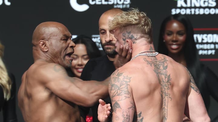 Mike Tyson slaps Jake Paul after weighing in at the Toyota Music Factory on November 14, 2024.  
