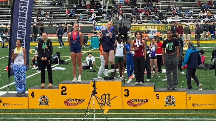 Jurupa Valley's AB Hernandez, a transgender student-athlete, stands atop the winner's podium at the CIF Southern Section finals after winning the triple jump.