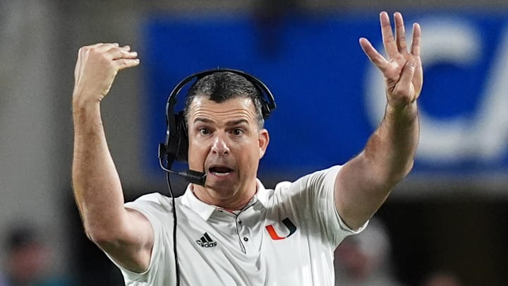 Dec 28, 2024; Orlando, FL, USA; Miami Hurricanes head coach Mario Cristobal reacts during the second half against the Iowa State Cyclones at Camping World Stadium. Mandatory Credit: Jasen Vinlove-Imagn Images Dec 28, 2024; Orlando, FL, USA; Miami Hurricanes head coach Mario Cristobal reacts during the second half against the Iowa State Cyclones at Camping World Stadium. Mandatory Credit: Jasen Vinlove-Imagn Images
